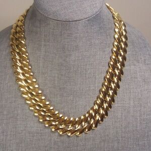 Gold tone collar necklace